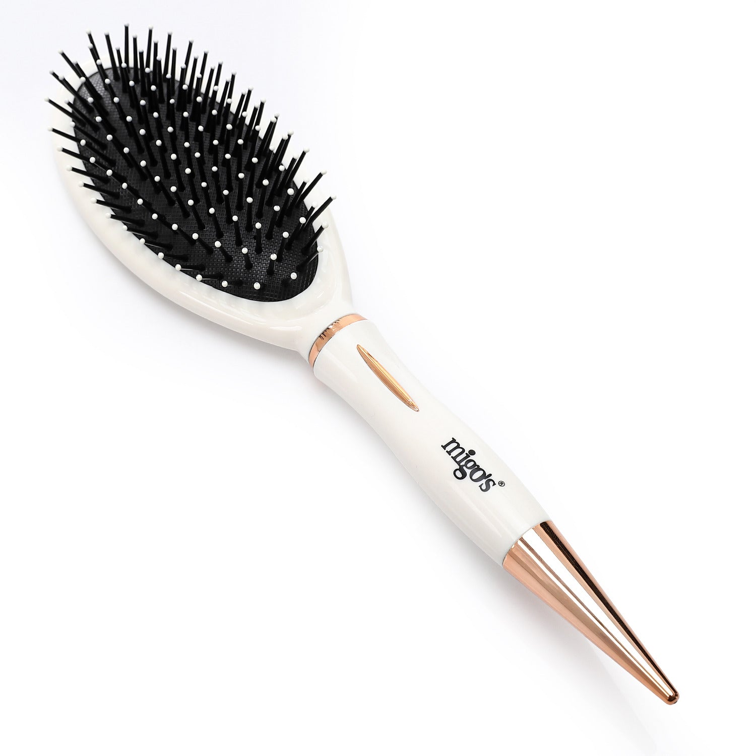 Migo's white hairbrush