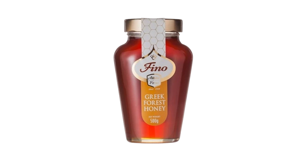 Far Trading Co. Fino Greek forest honey in a 500g glass jar with a gold lid and elegant label design.