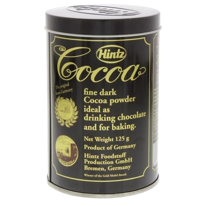 Far Trading Co. Hintz raw cocoa powder in a black 125g tin with gold lettering and vintage-style branding.
