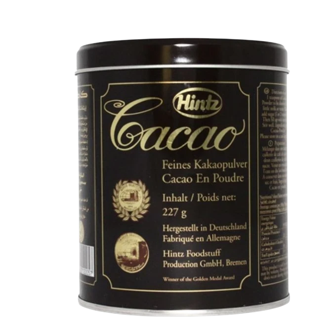 Far Trading Co. Hintz raw cocoa powder in a black 227g metal tin with gold lettering and product details