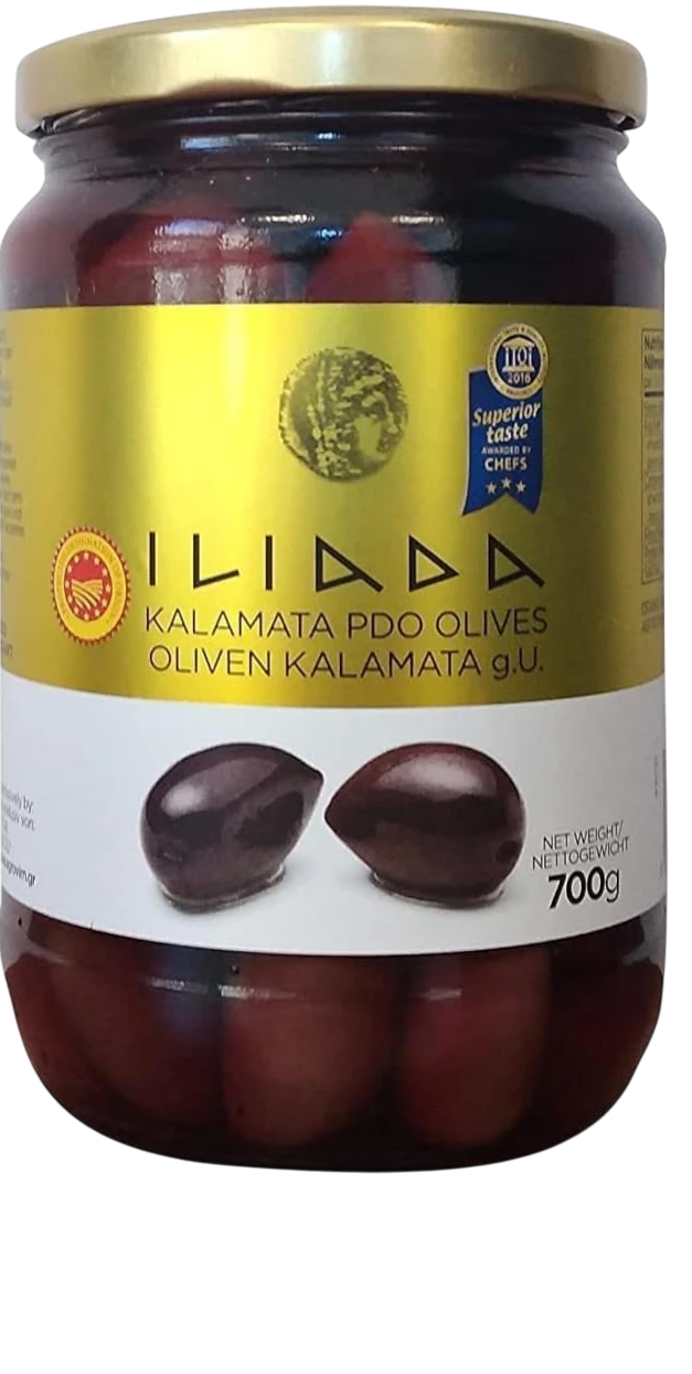 Far Trading Co. Iliada pitted Kalamata olives in a 700g glass jar with a gold label and Superior Taste award seal.